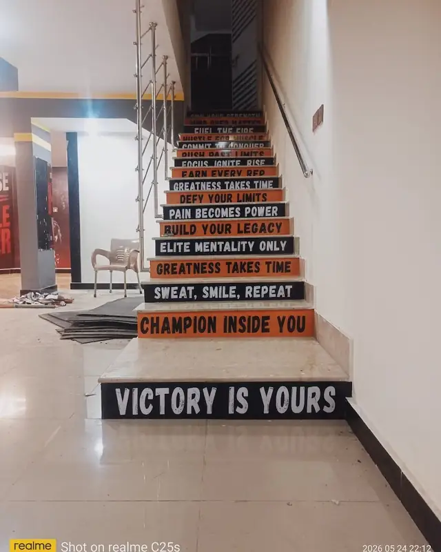Stairs with the gym motto Victory is yours