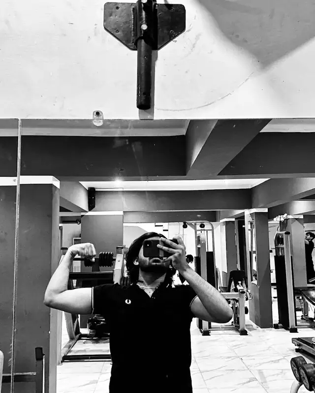 Black and white photo of a member training